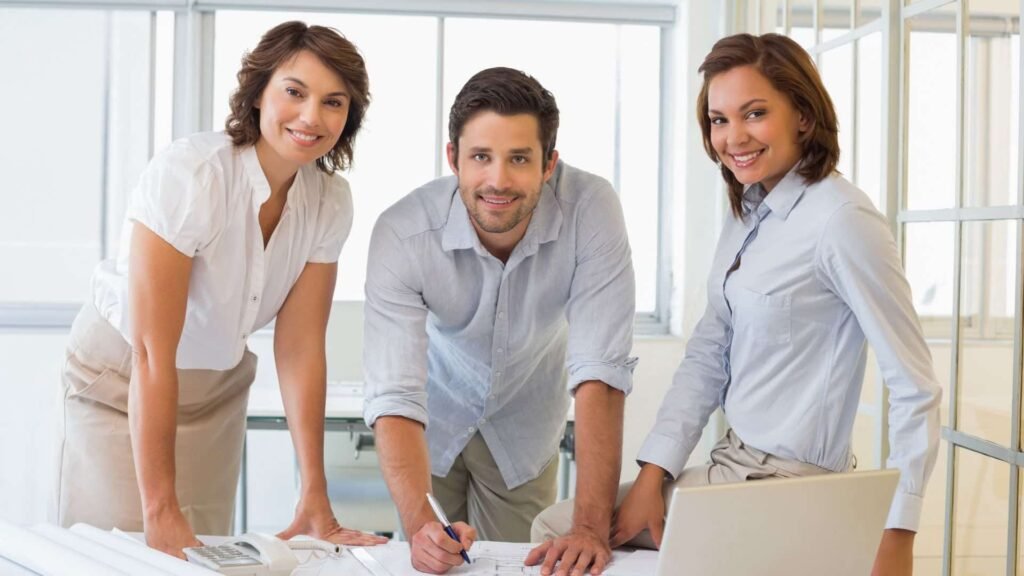 Three confident architects representing a professional and modern presence through a well-designed website for architects.